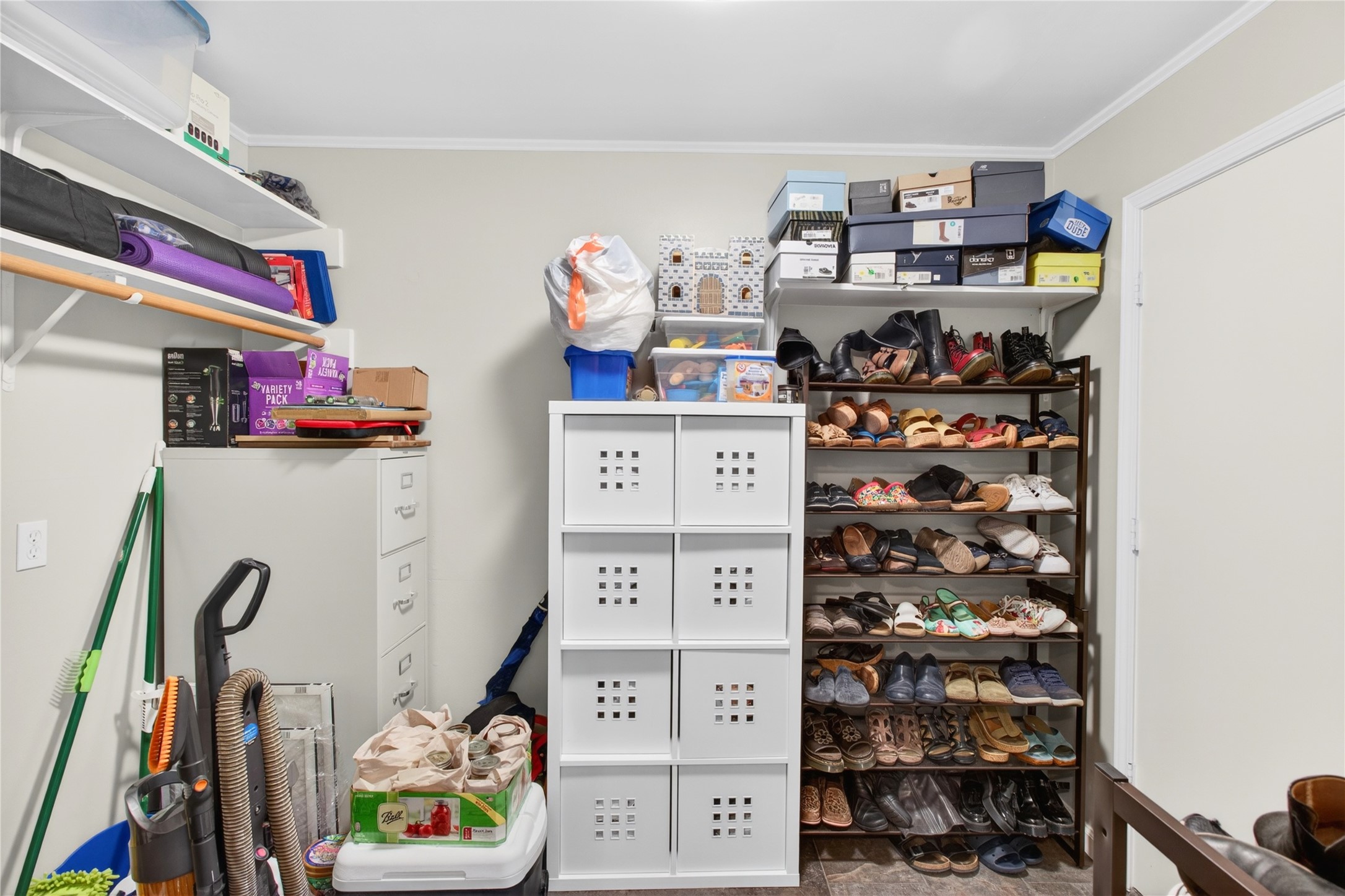 20214 Woodsboro Court Spring, TX 77388 - Photo 23 of 50 Extra Rm between Laundry Rm & Garage! Currently used as "Shoe Room" & storage! Could be Office or Extra Closet...you decide!
