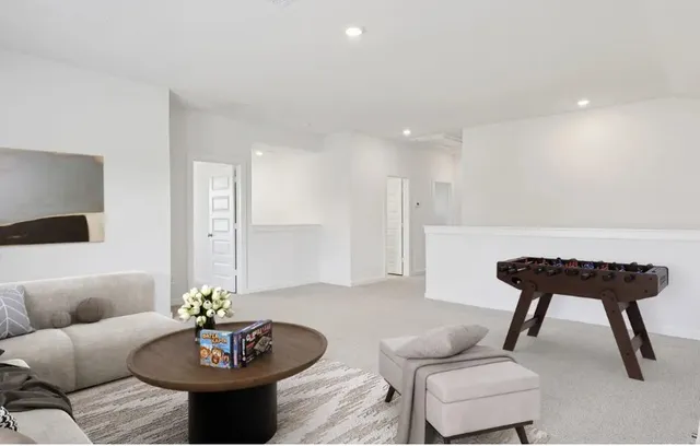 a living room with furniture and a couch