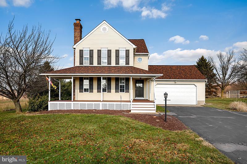3826 Bark Hill Road Union Bridge, MD 21791 - Photo 1 of 30 a front view of a house with a yard