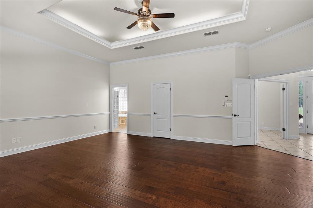 2584 Butler Hill Road Benton, LA 71006 - Photo 23 of 37 wooden floor in an empty room