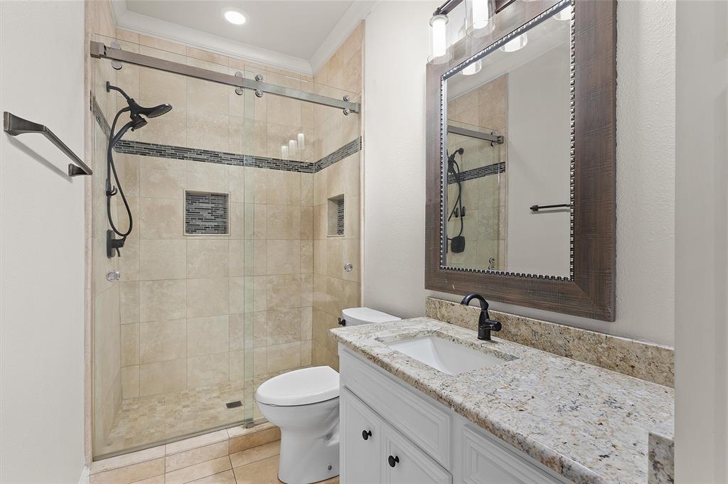 2584 Butler Hill Road Benton, LA 71006 - Photo 33 of 37 a bathroom with a granite countertop sink toilet and shower