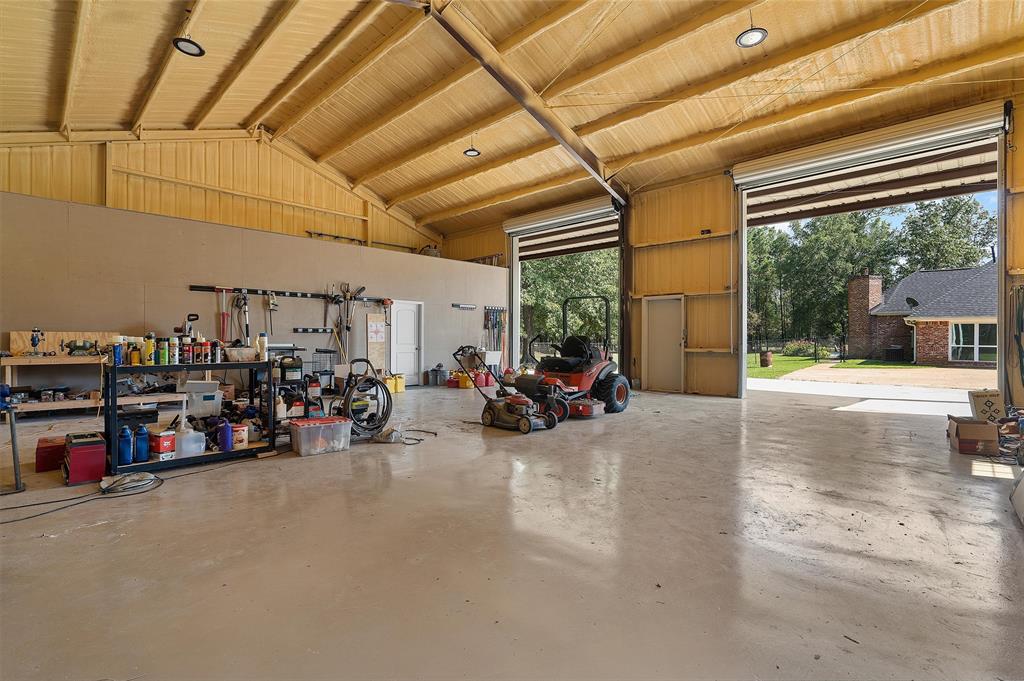 2584 Butler Hill Road Benton, LA 71006 - Photo 35 of 37 a view of a garage with storage