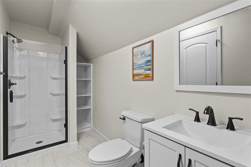 2584 Butler Hill Road Benton, LA 71006 - Photo 37 of 37 a bathroom with a sink a toilet and shower