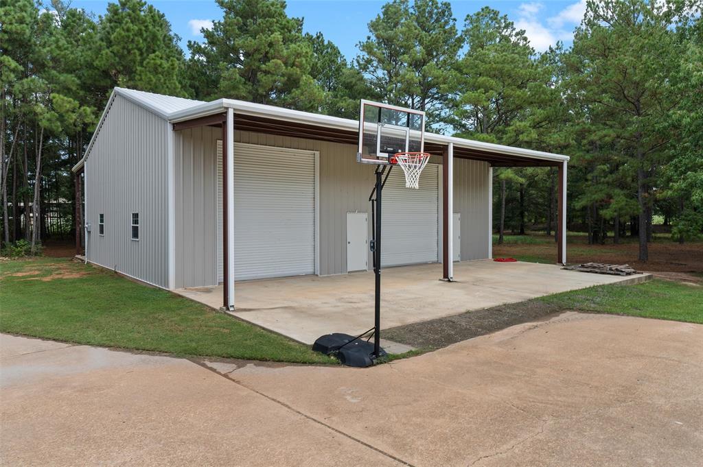 2584 Butler Hill Road Benton, LA 71006 - Photo 6 of 37 a view of a car garage of the house