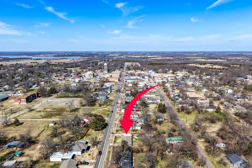 701 Southwest 1st Street Cooper, TX 75432 - Photo 22 of 22 an aerial view of a houses with a city