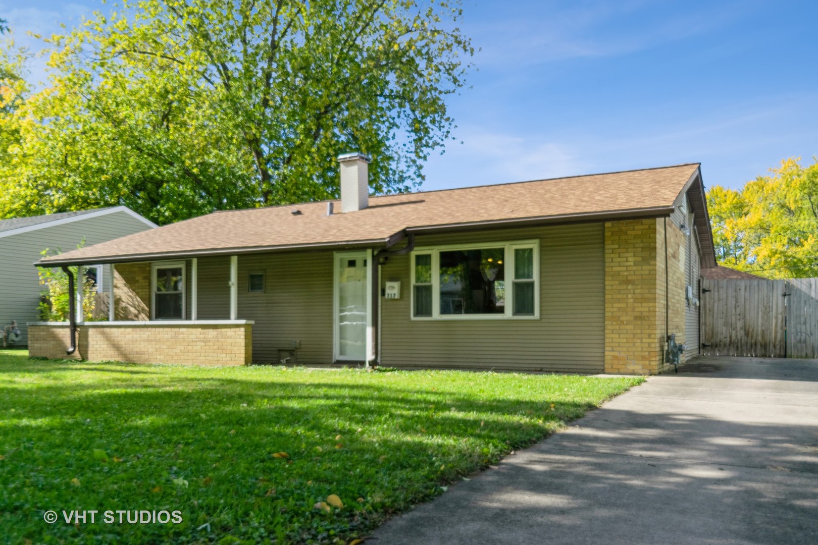 front view of a house with a yard