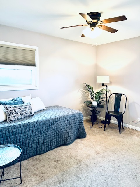 317 Stuart Road Lockport, IL 60441 - Photo 11 of 16 a bedroom with a bed and a chair