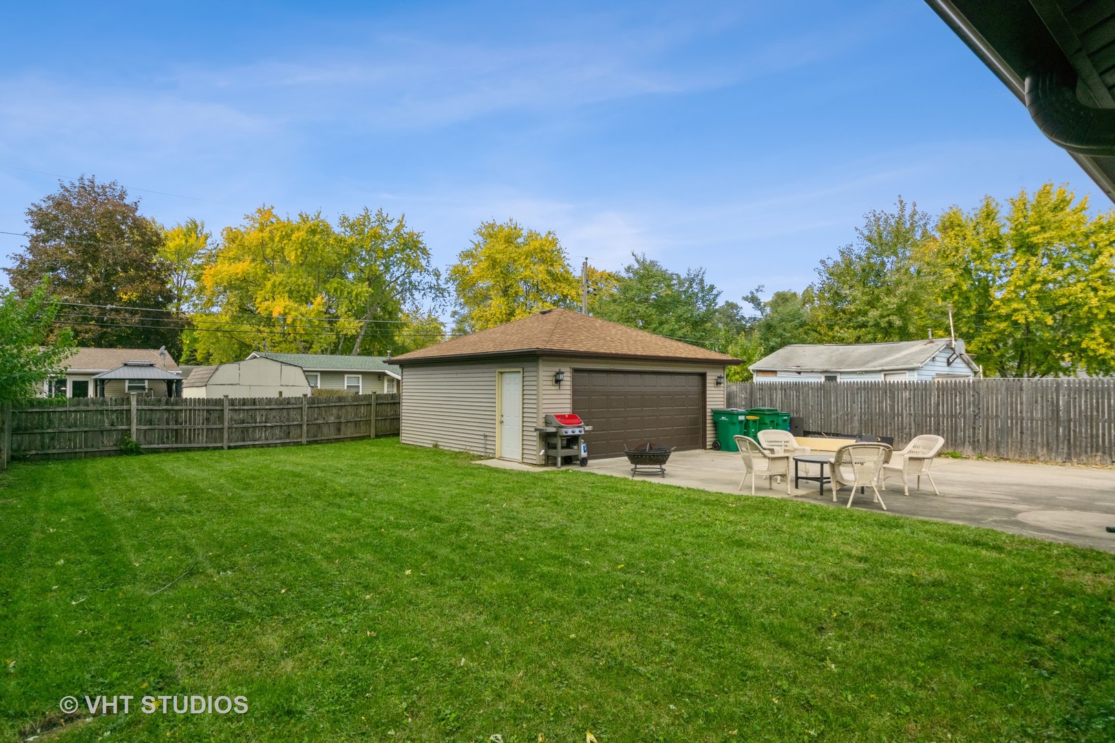317 Stuart Road Lockport, IL 60441 - Photo 15 of 16 a view of backyard with house and outdoor seating