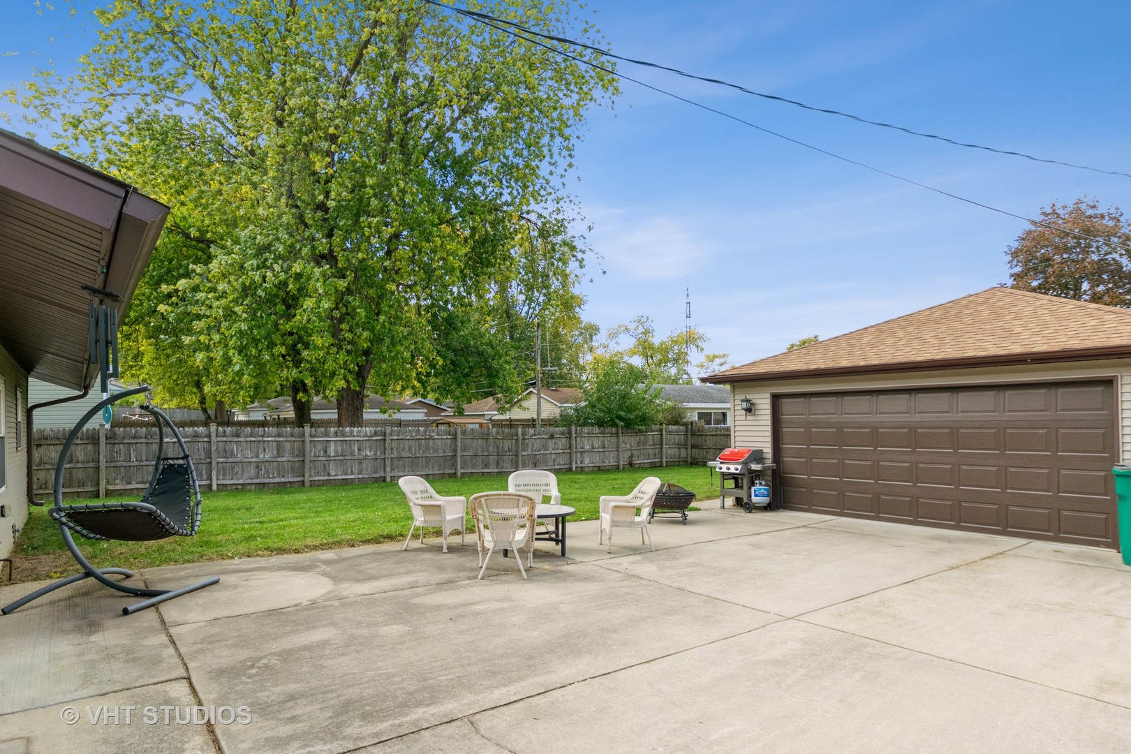 317 Stuart Road Lockport, IL 60441 - Photo 16 of 16 a view of a lounge chair in the back yard of the house