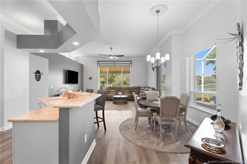 758 Southwest Blue Stem Way Stuart, FL 34997 - Photo 16 of 49 a view of a dining room with furniture window and outside view