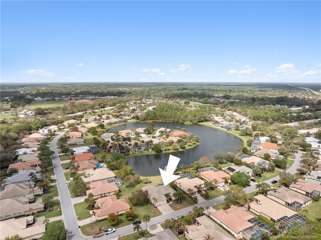 758 Southwest Blue Stem Way Stuart, FL 34997 - Photo 49 of 49 an aerial view of a city with ocean view