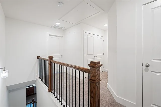 a view of hallway with stairs