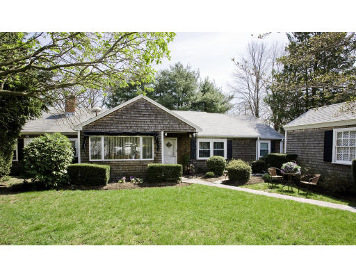 a house view with a garden space