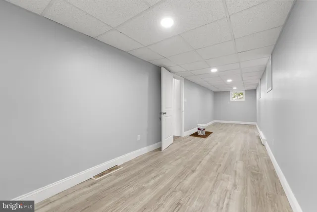 a view of a big room with wooden floor