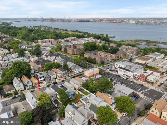 an aerial view of a city with lots of residential buildings