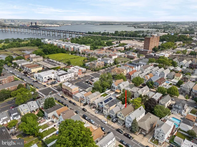 an aerial view of a city with lots of residential buildings