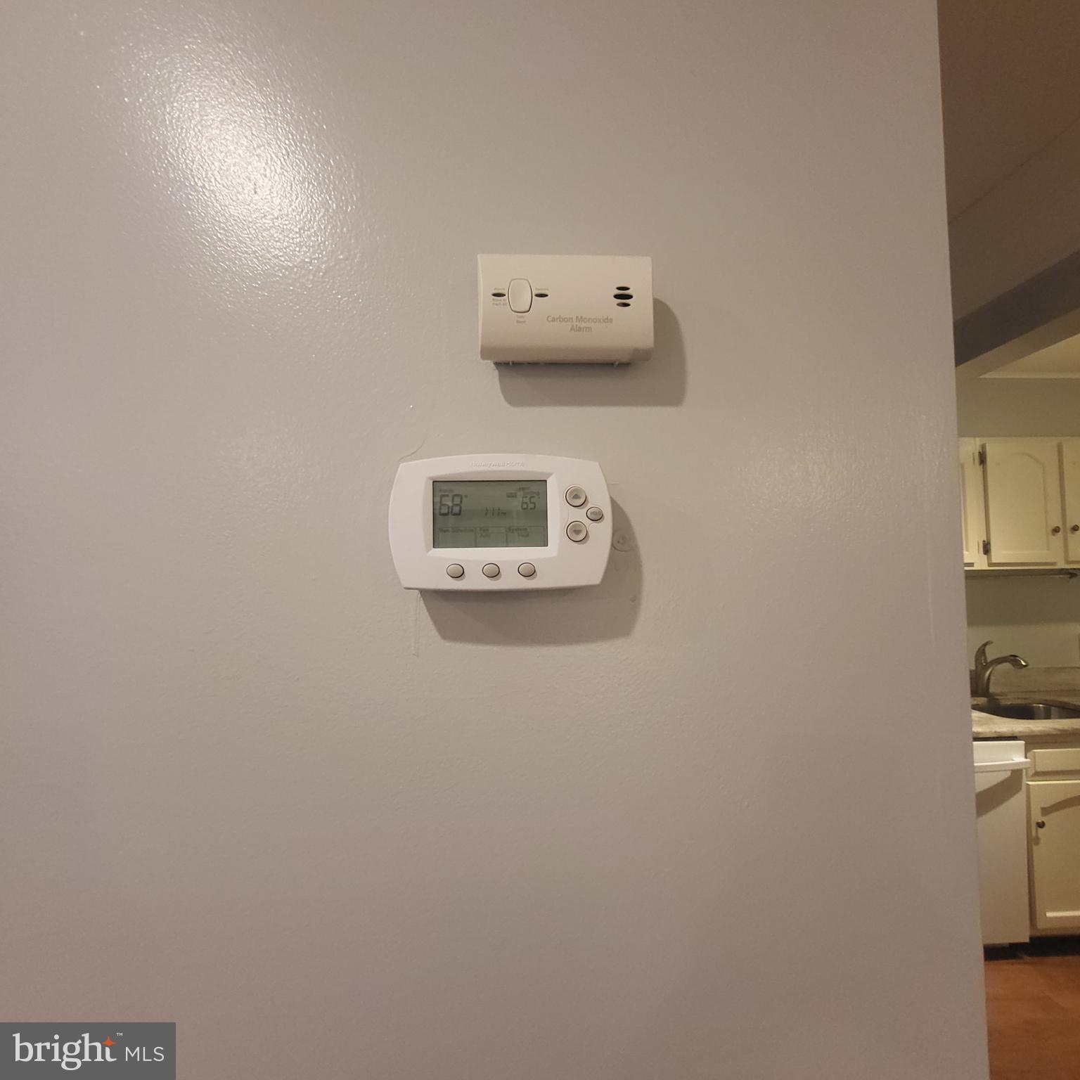 5800 Cove Landing Road, Unit 303 Burke, VA 22015 - Photo 38 of 84 a wall with a refrigerator freezer and a stove top oven