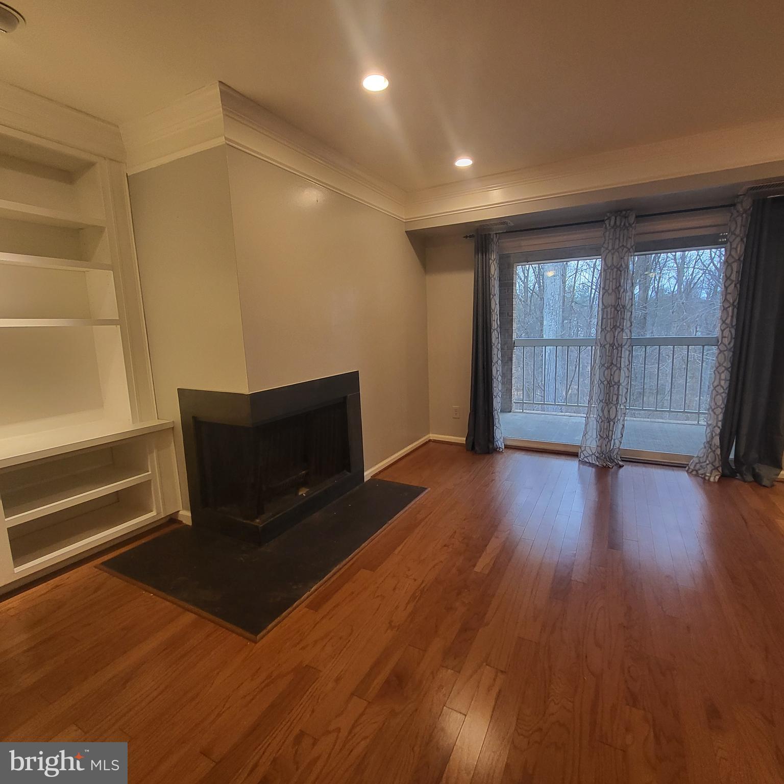 5800 Cove Landing Road, Unit 303 Burke, VA 22015 - Photo 9 of 84 Fireplace! Wooded view from patio