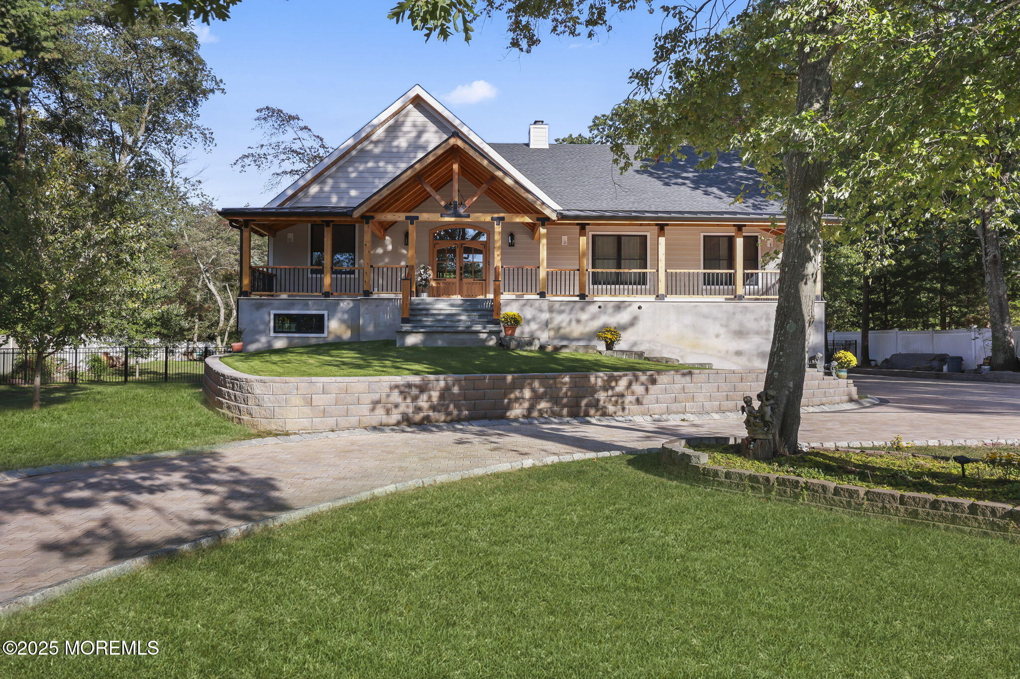 422 Green Grove Road Asbury Park, NJ 07712 - Photo 2 of 82 a front view of a house with garden