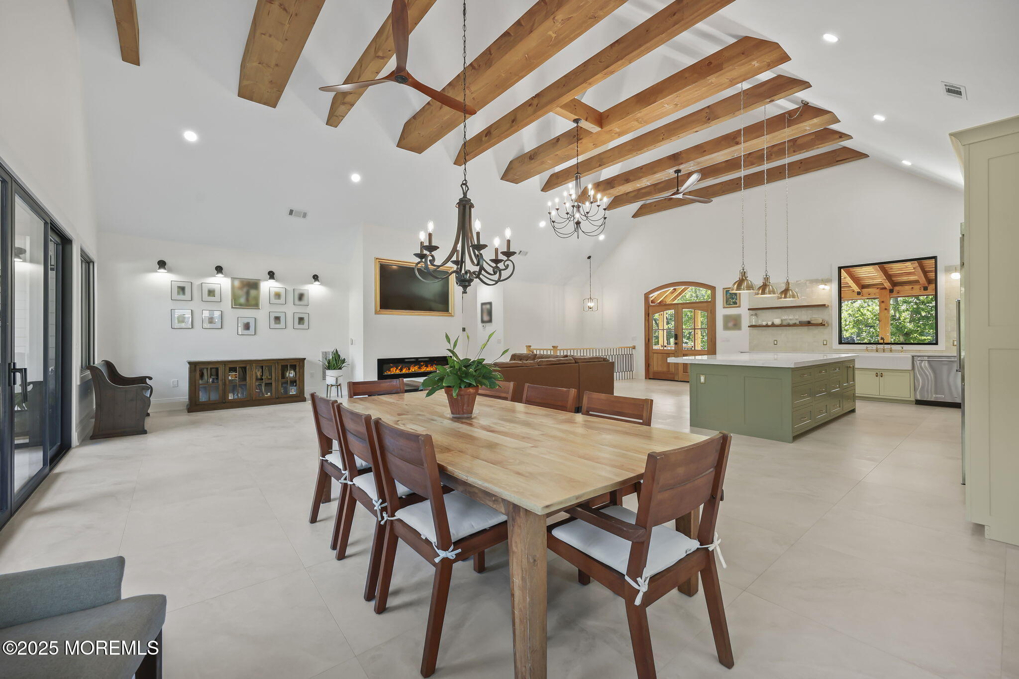 422 Green Grove Road Asbury Park, NJ 07712 - Photo 27 of 82 a view of a dining room with furniture and a chandelier