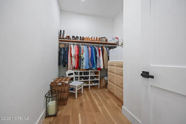 a front view of a house with a yard table and chairs