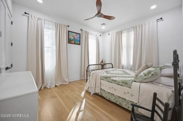 a view of swimming pool with chairs