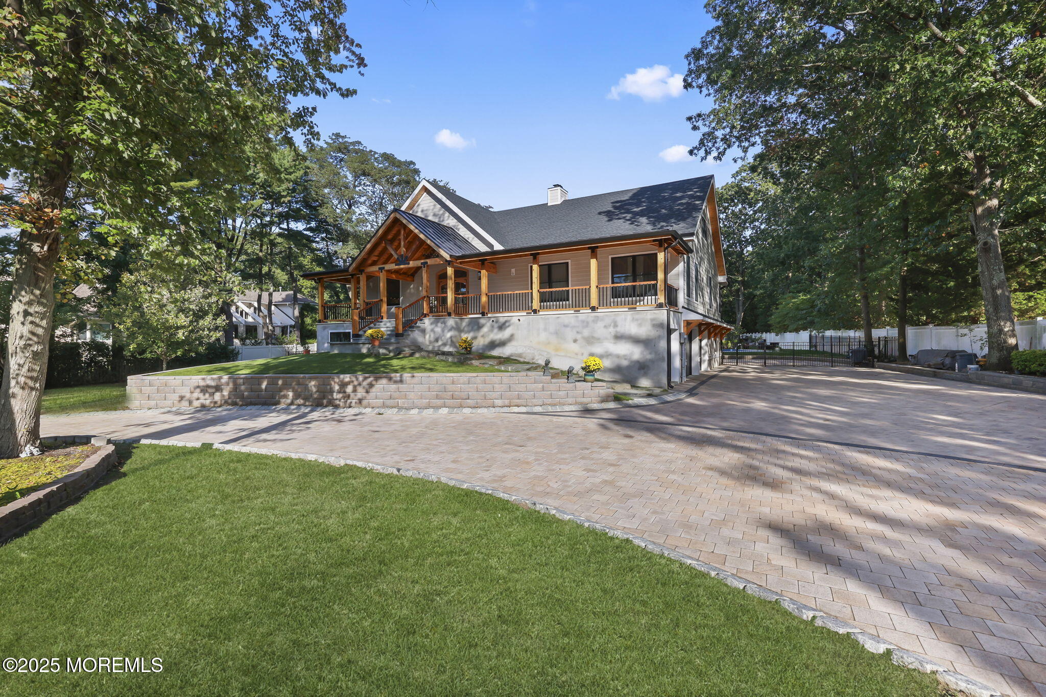 422 Green Grove Road Asbury Park, NJ 07712 - Photo 4 of 82 a front view of a house with garden and sitting area