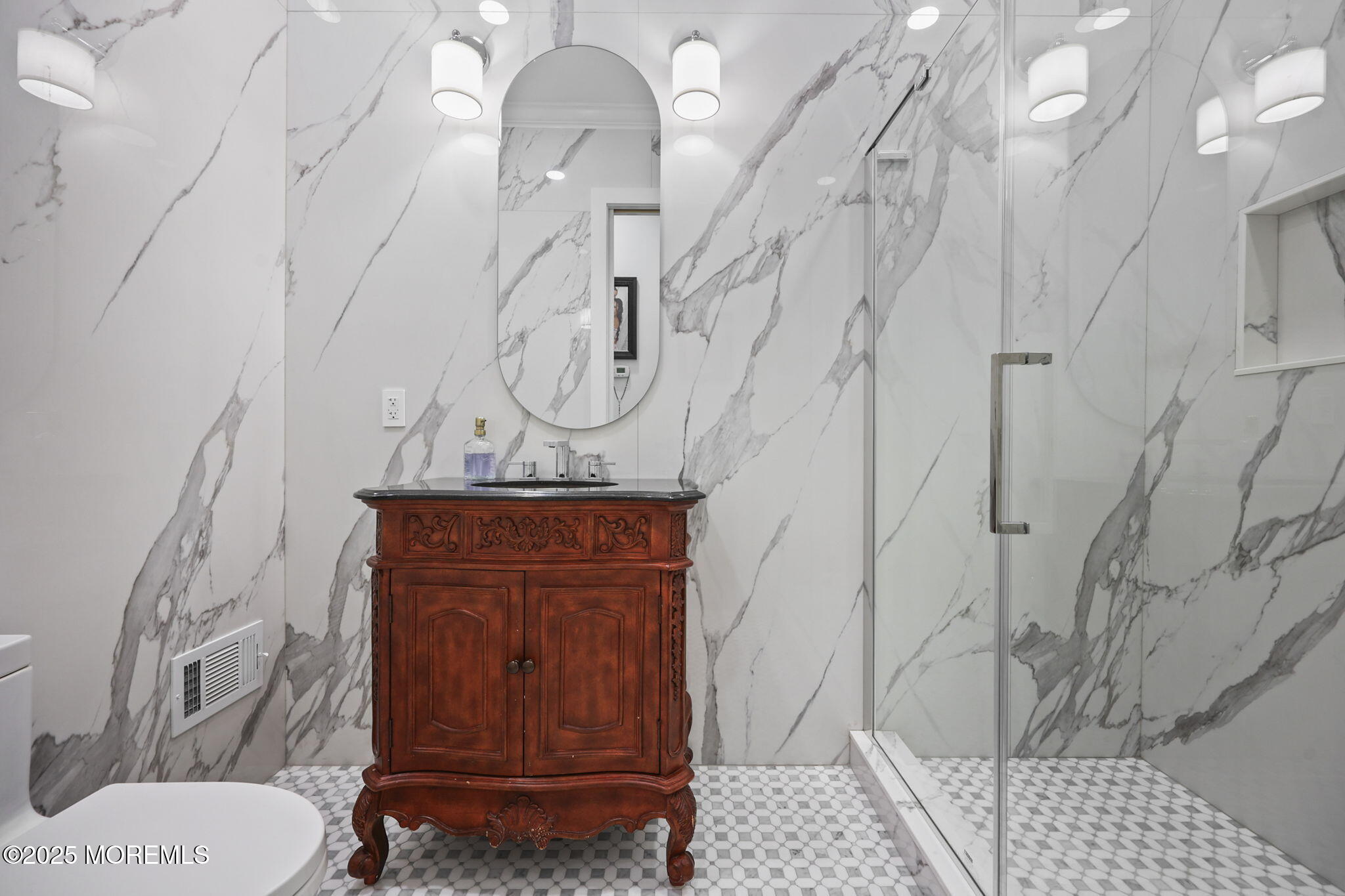 422 Green Grove Road Asbury Park, NJ 07712 - Photo 42 of 82 a bathroom with a granite countertop sink a toilet and shower
