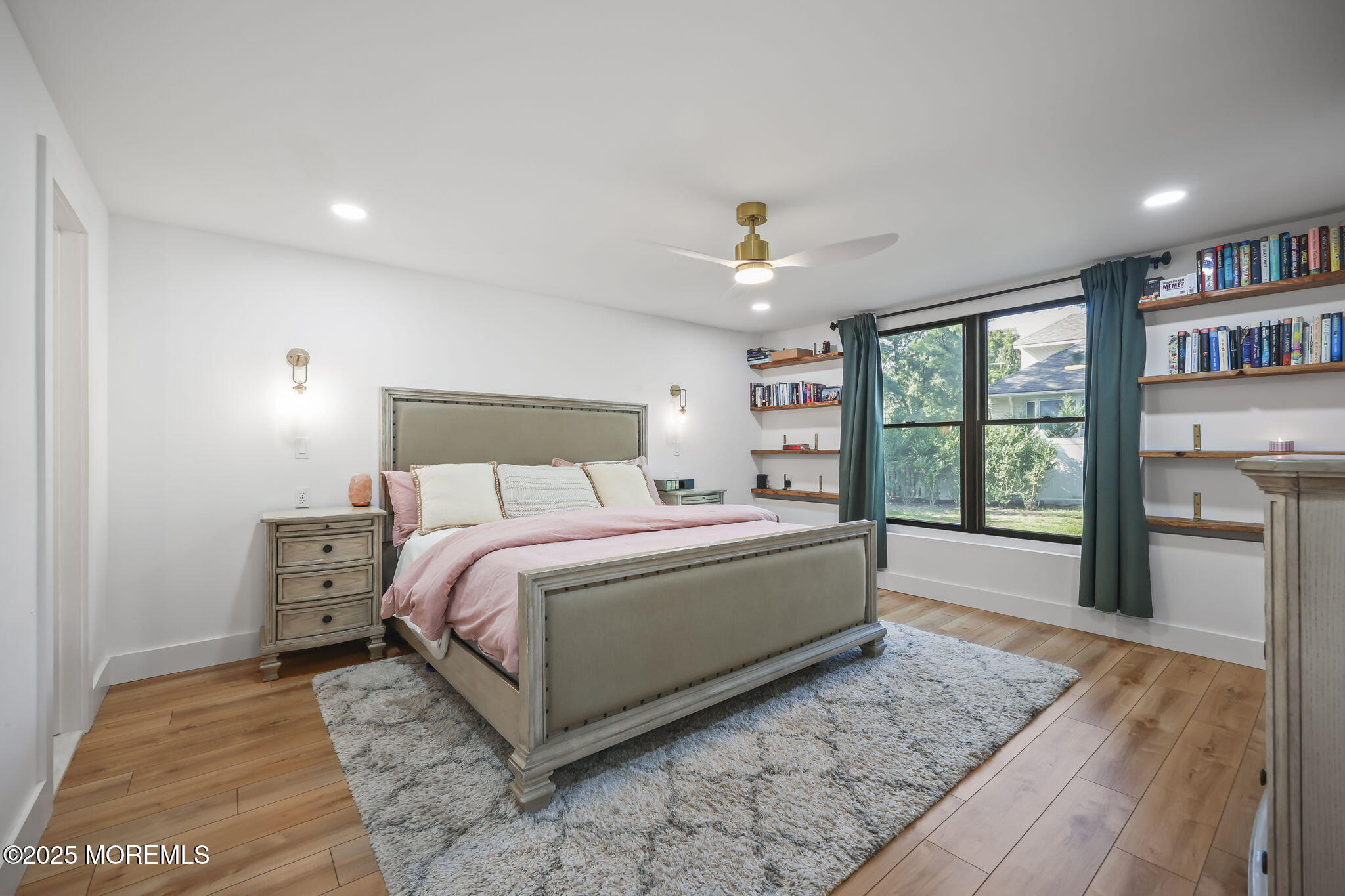 422 Green Grove Road Asbury Park, NJ 07712 - Photo 48 of 82 a bed sitting in a bedroom next to a window