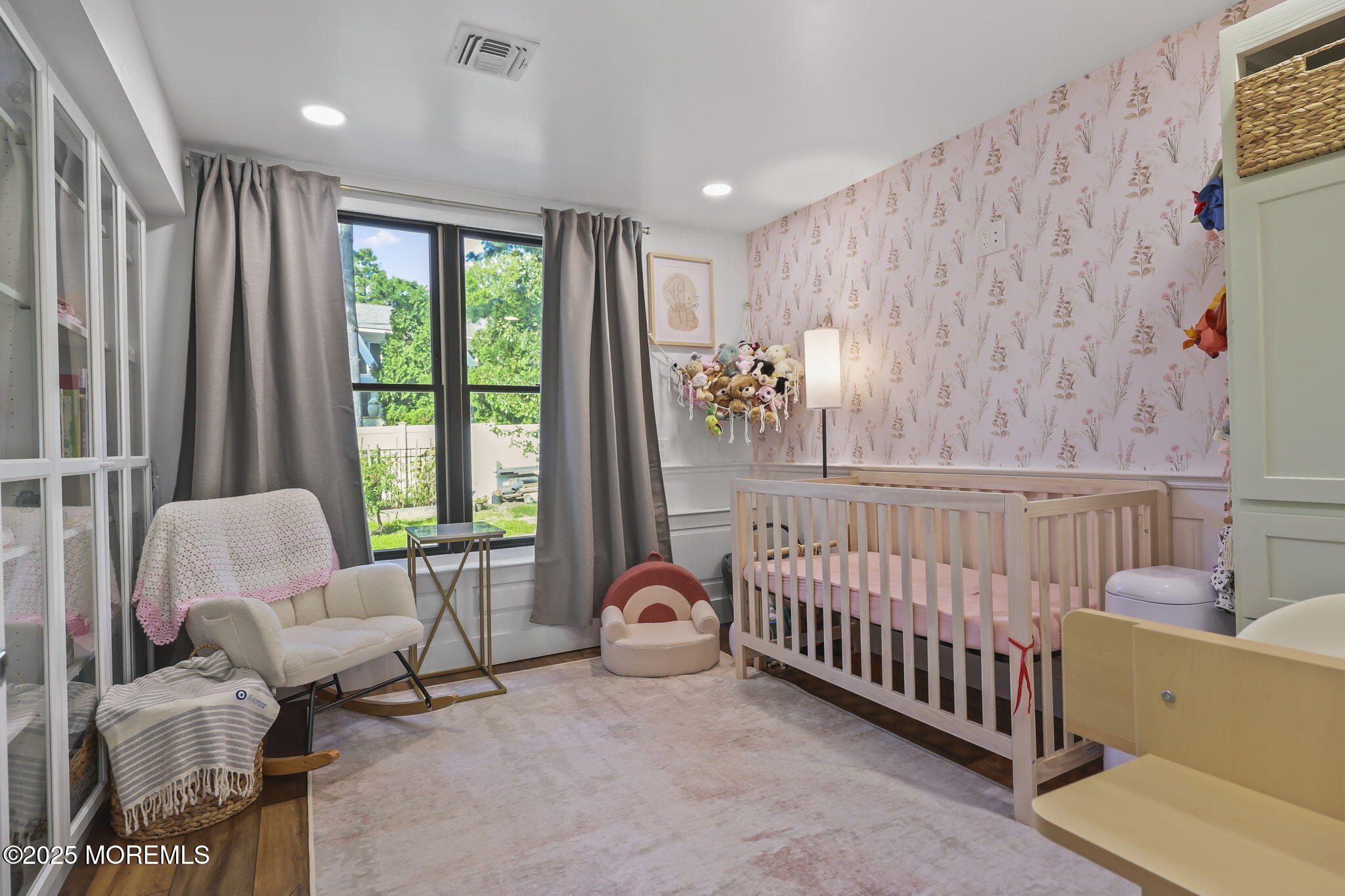 422 Green Grove Road Asbury Park, NJ 07712 - Photo 50 of 82 a bedroom with furniture and a large window