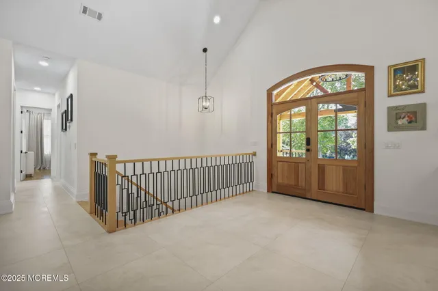 a kitchen with counter top space sink and window