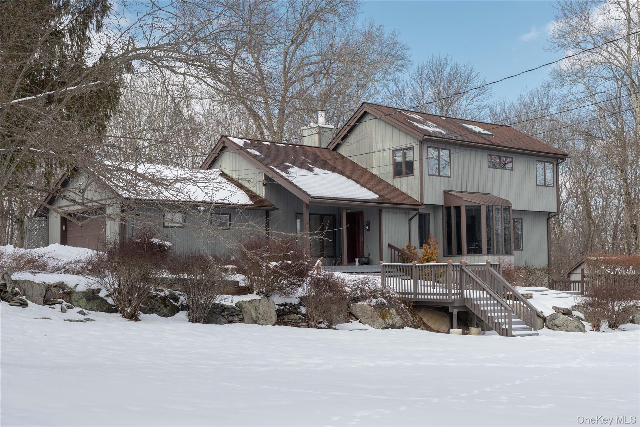 224 Last Road Middletown, NY 10941 - Photo 1 of 39 a front view of a house with a yard covered in snow