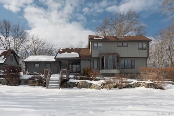 a room with table and chairs