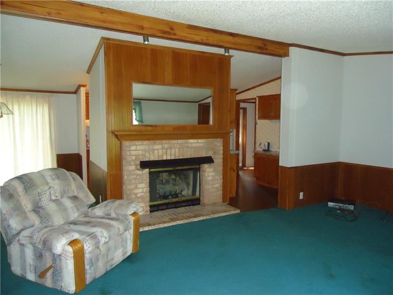 191 Allen Road Beaver Falls, PA 15010 - Photo 2 of 24 Propane-brick & wood fireplace.
