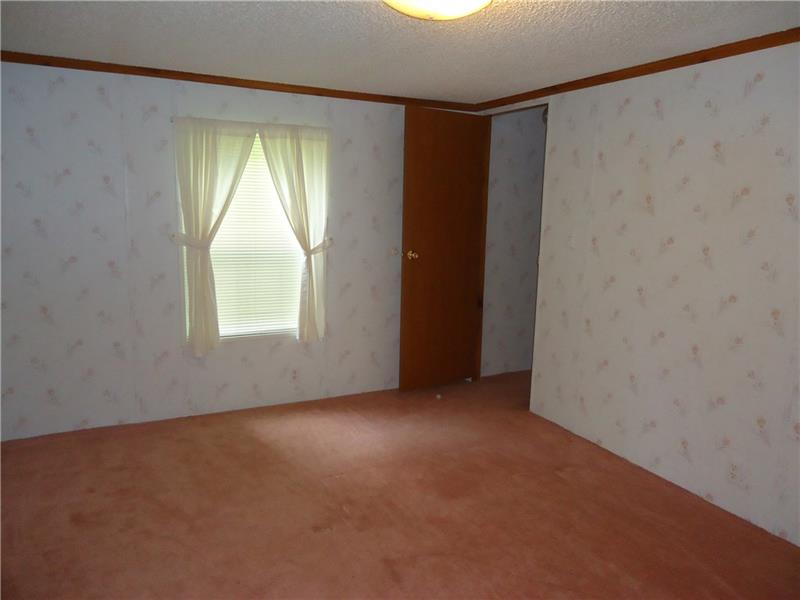 191 Allen Road Beaver Falls, PA 15010 - Photo 11 of 24 Front bedroom on left side.