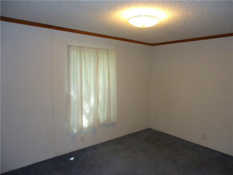 191 Allen Road Beaver Falls, PA 15010 - Photo 12 of 24 Rear bedroom on left side.