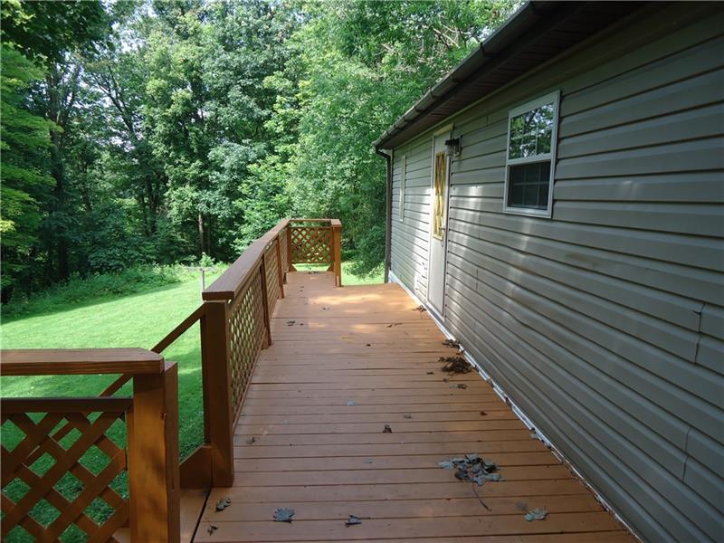 191 Allen Road Beaver Falls, PA 15010 - Photo 16 of 24 Deck extension with 2 sets of stairs to yard.