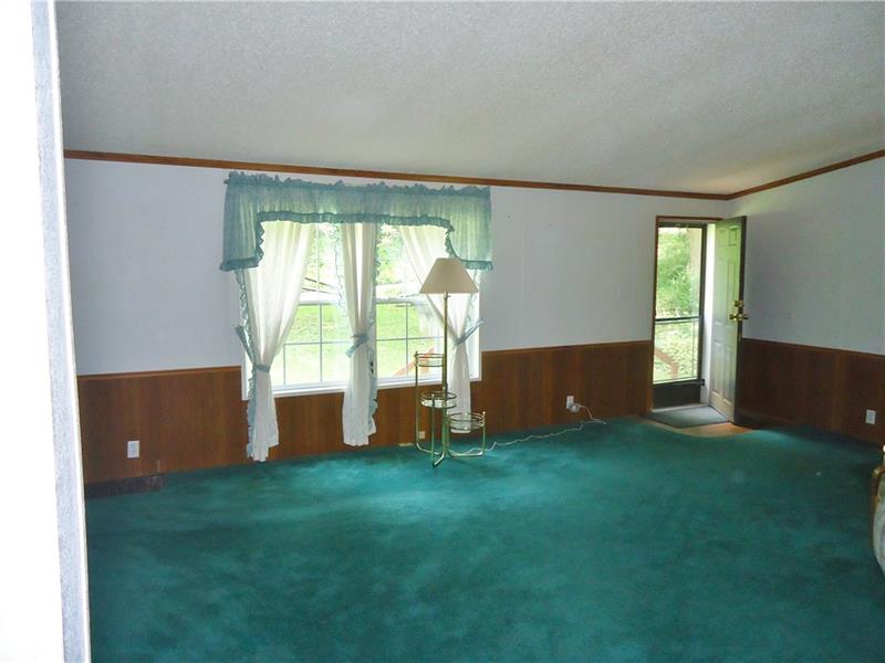 191 Allen Road Beaver Falls, PA 15010 - Photo 3 of 24 Front entry and window into the spacious living room.