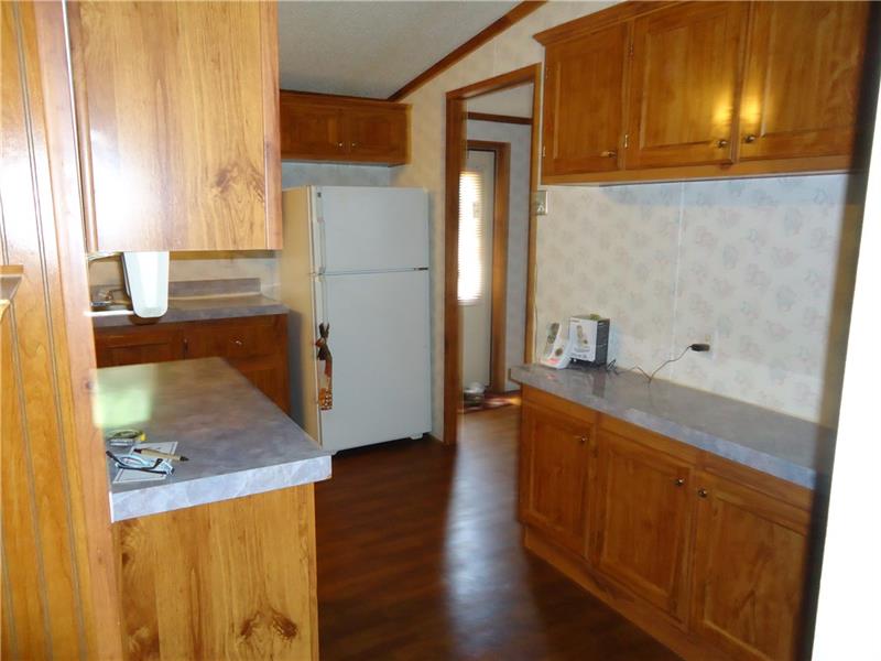 191 Allen Road Beaver Falls, PA 15010 - Photo 7 of 24 View from living room into kitchen nook area.