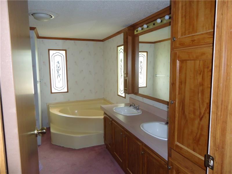191 Allen Road Beaver Falls, PA 15010 - Photo 10 of 24 Double sinks, large tub and separate shower.