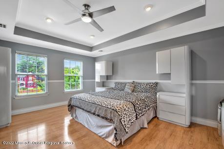 335 Buckalew Road Freehold, NJ 07728 - Photo 16 of 38 a bedroom with a large bed window and walk in closet