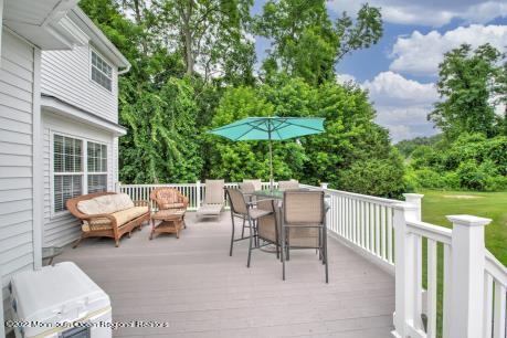 335 Buckalew Road Freehold, NJ 07728 - Photo 5 of 38 a view of backyard with furniture and garden