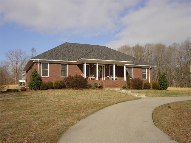 2564 Lanning Road Lawrenceburg, TN 38464 - Photo 1 of 20 a front view of a house with a yard