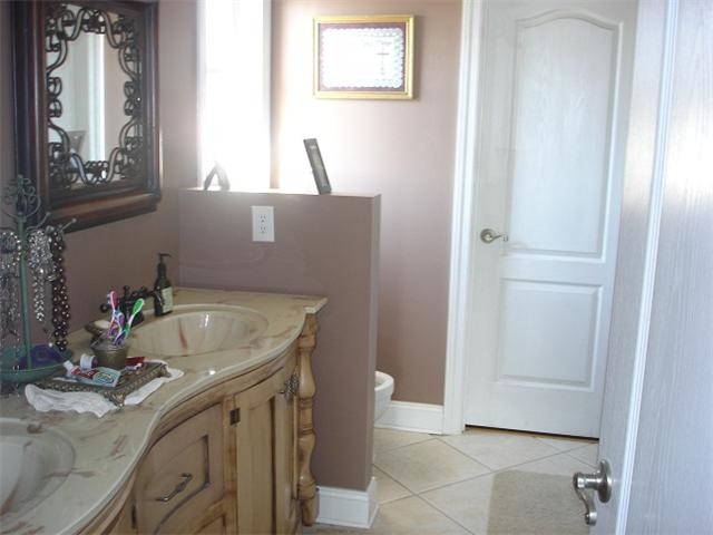 2564 Lanning Road Lawrenceburg, TN 38464 - Photo 11 of 20 a bathroom with a sink and a mirror