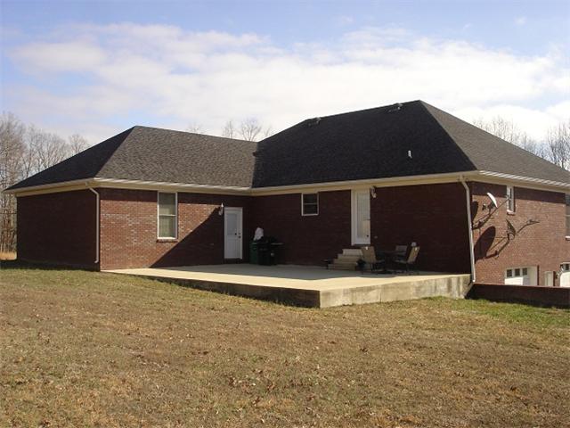 2564 Lanning Road Lawrenceburg, TN 38464 - Photo 3 of 20 front view of house with a yard