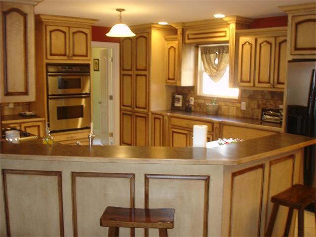 2564 Lanning Road Lawrenceburg, TN 38464 - Photo 6 of 20 a kitchen with stainless steel appliances granite countertop a sink a stove and a refrigerator