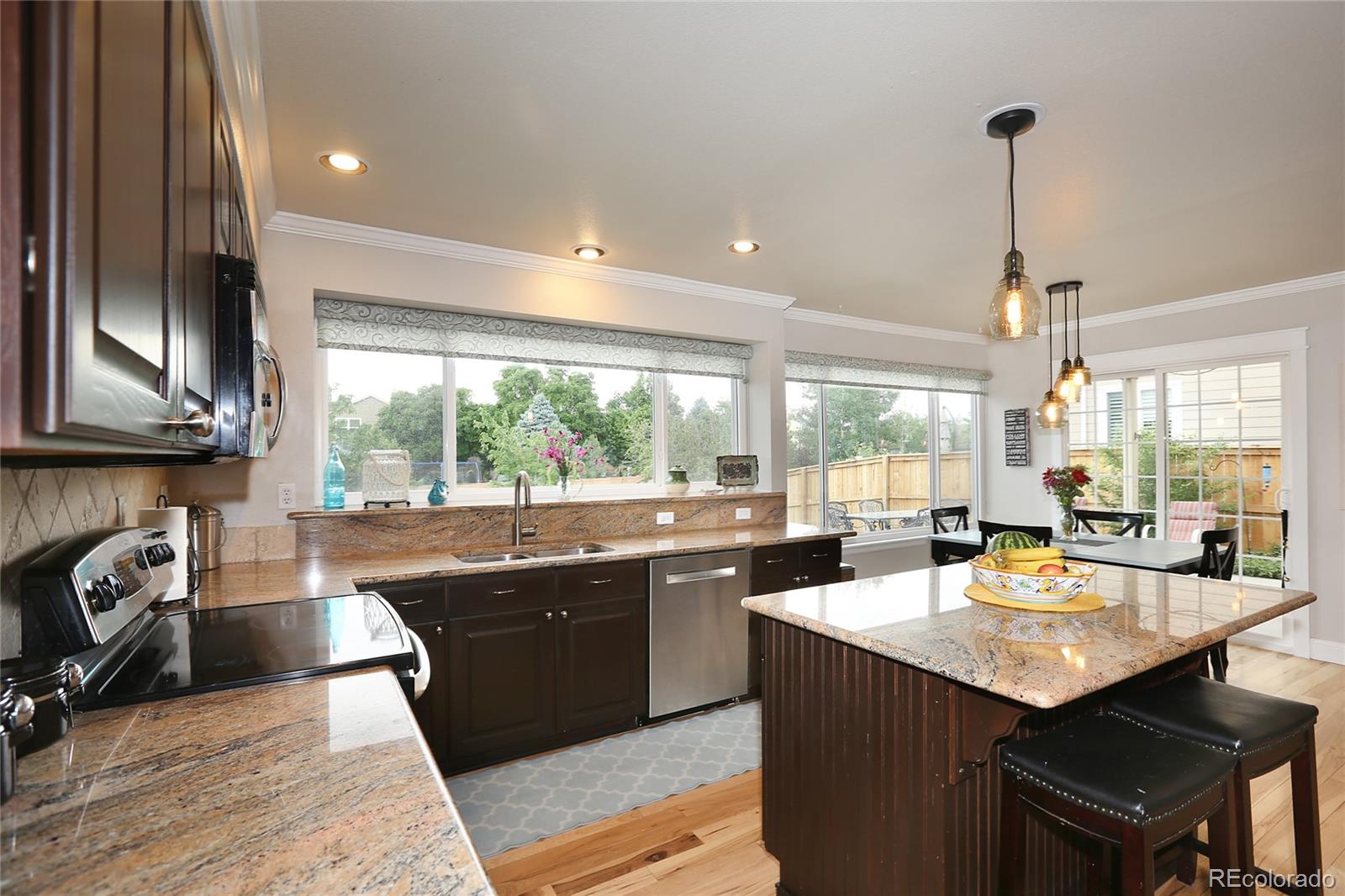 9764 Spring Hill Street Highlands Ranch, CO 80129 - Photo 14 of 32 a kitchen with lots of counter top space