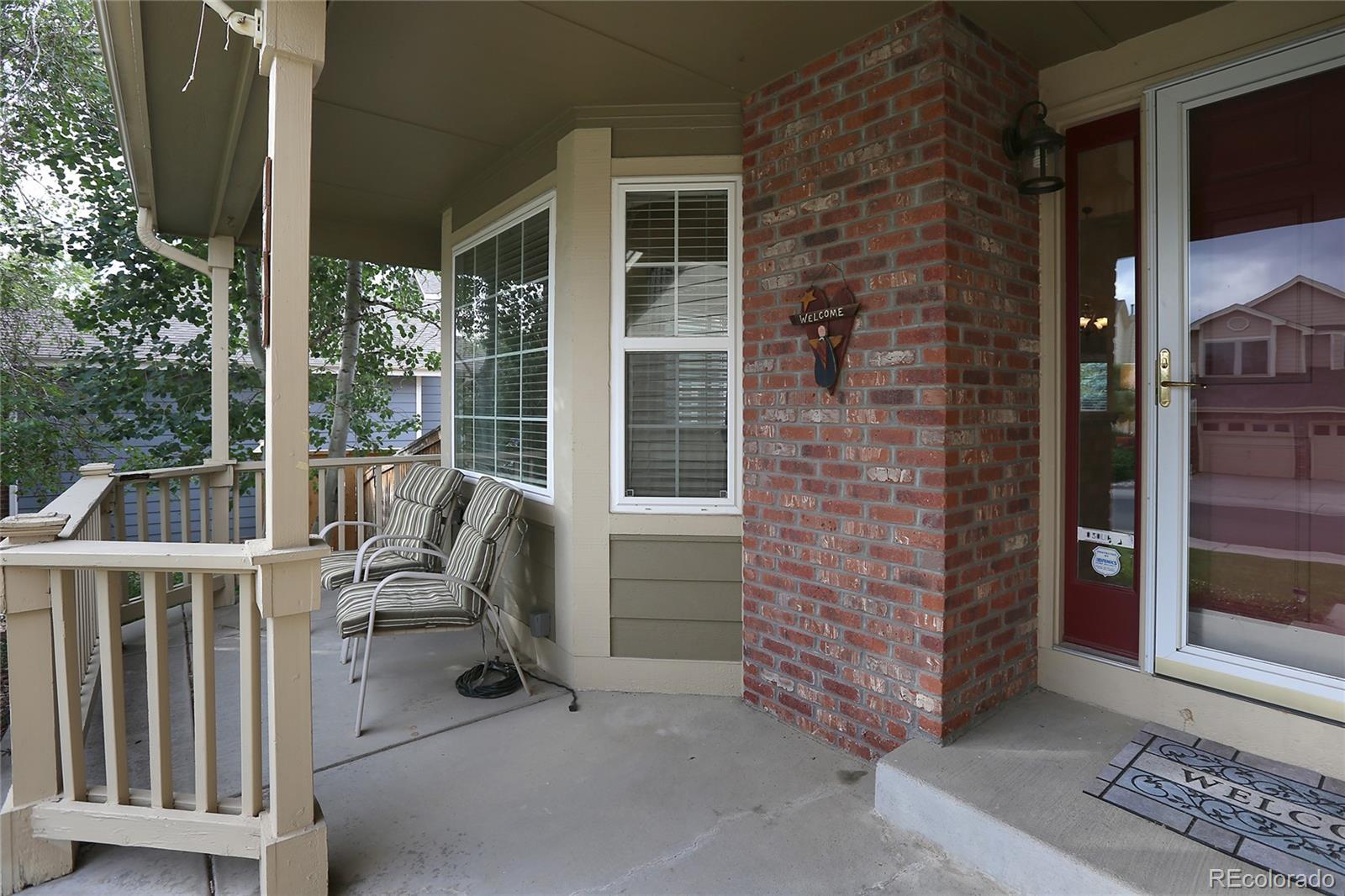 9764 Spring Hill Street Highlands Ranch, CO 80129 - Photo 3 of 32 a view of balcony with furniture