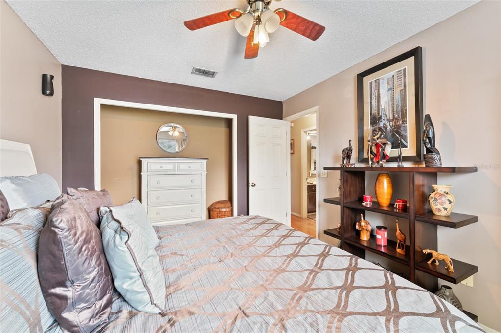 9083 Sable Ridge Court Jacksonville, FL 32244 - Photo 19 of 38 a bed room with a bed and a closet