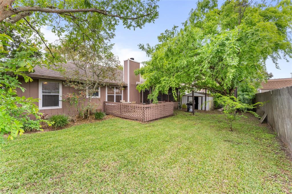 9083 Sable Ridge Court Jacksonville, FL 32244 - Photo 33 of 38 a view of an house with backyard space and garden